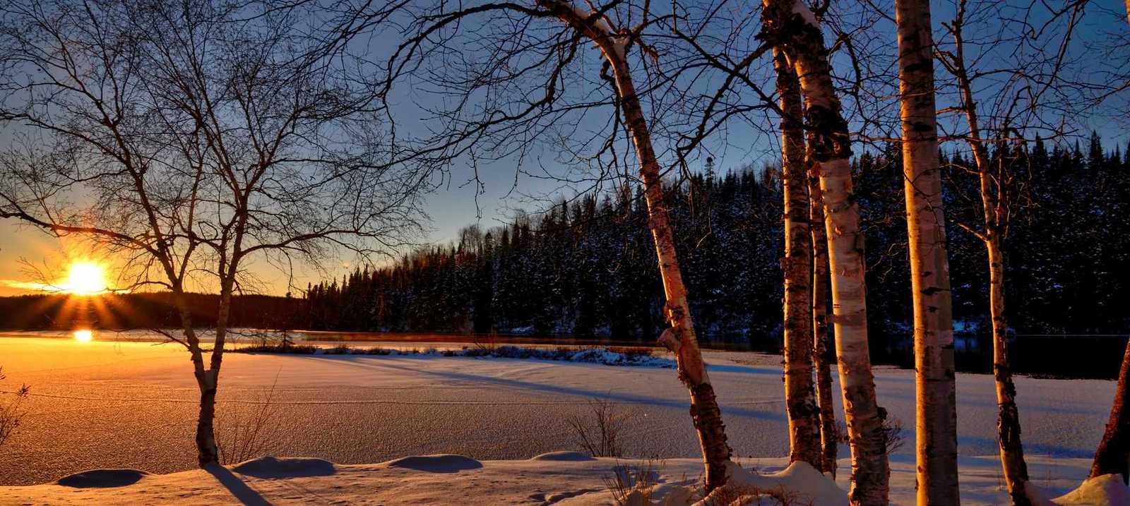 Winterlandschaft mit Sonnenuntergang